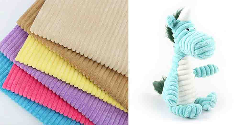 Stacked colorful corduroy fabrics in beige, yellow, purple, pink, and blue shown next to a plush dragon toy made from corduroy.