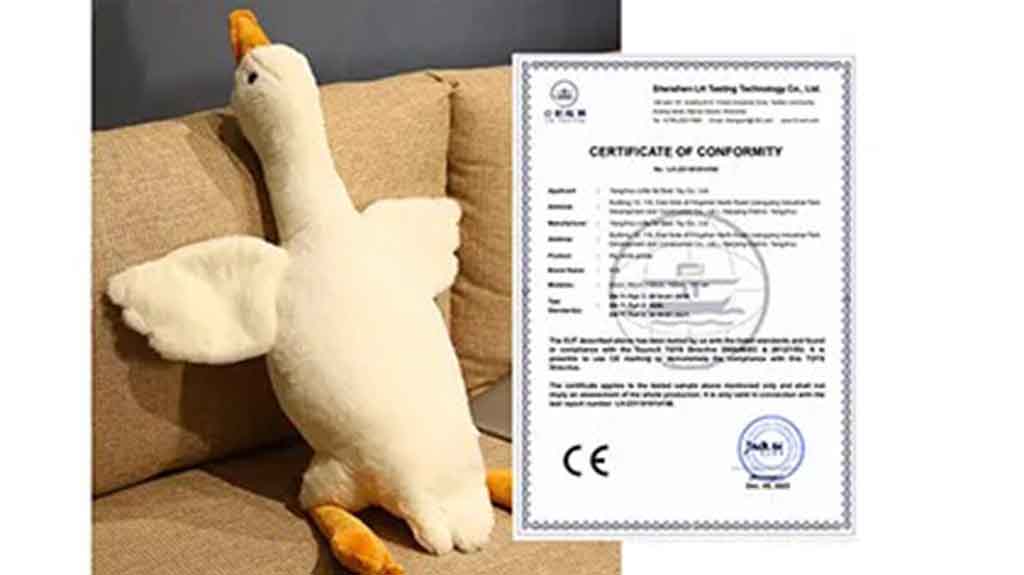 White plush goose toy beside CE compliance certificate.