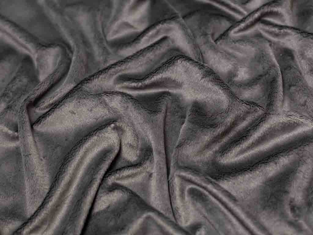 Close-up of soft slate grey velboa faux fur fabric with smooth texture.