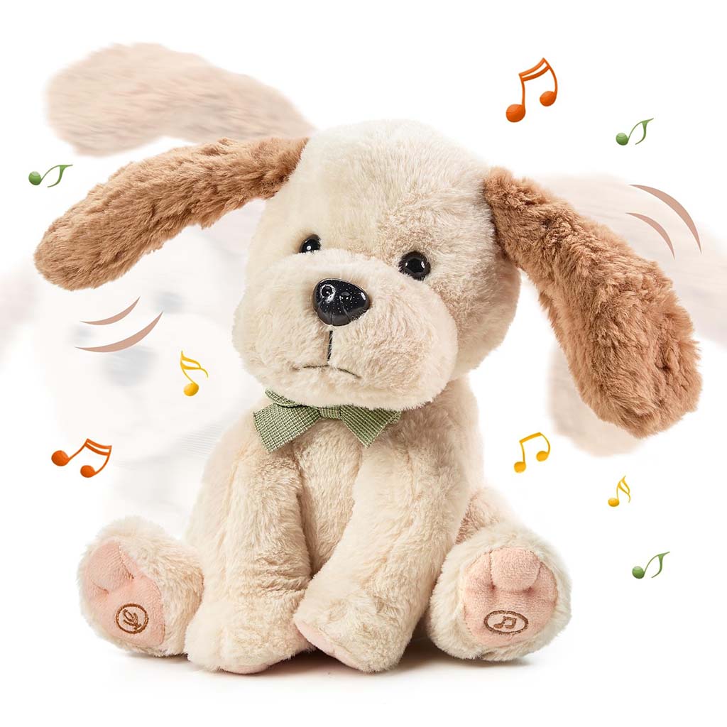 Beige plush dog toy with floppy ears, green bow tie, and musical notes indicating sound and movement features.