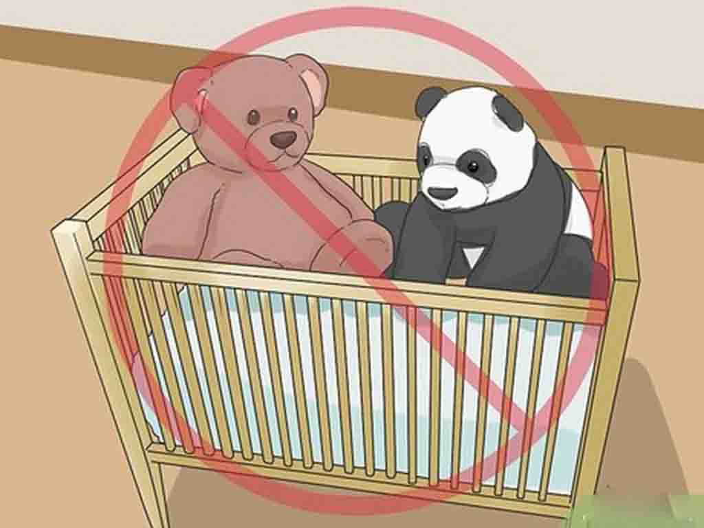 Illustration of a crib with teddy bears inside, crossed out with a red circle, showing it is unsafe for babies to sleep with stuffed animals.