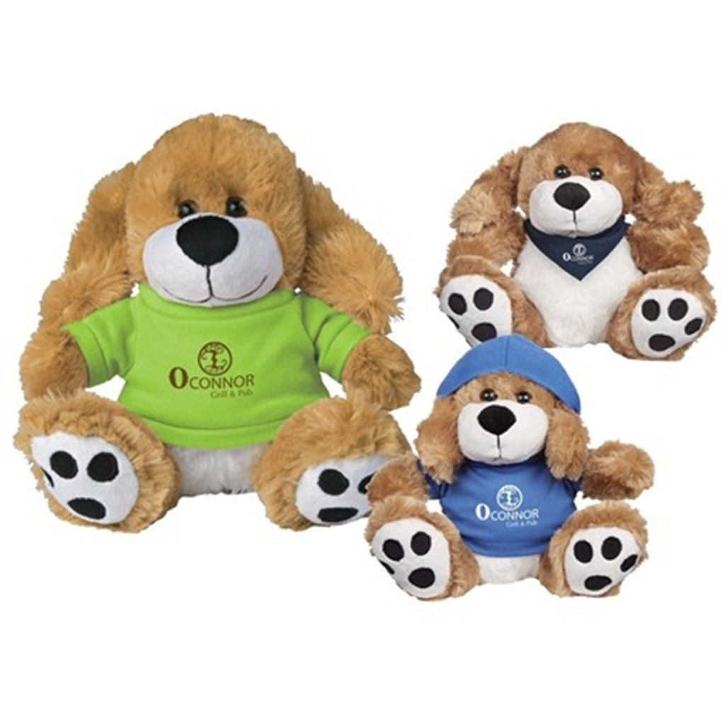 Three brown dog plush toys wearing custom printed outfits with O’Connor logo, including a green shirt, blue hoodie, and blue bandana.