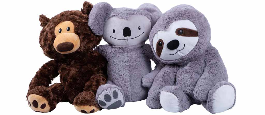 Plush bear, koala, and sloth stuffed animals sitting side by side with soft, cuddly designs.