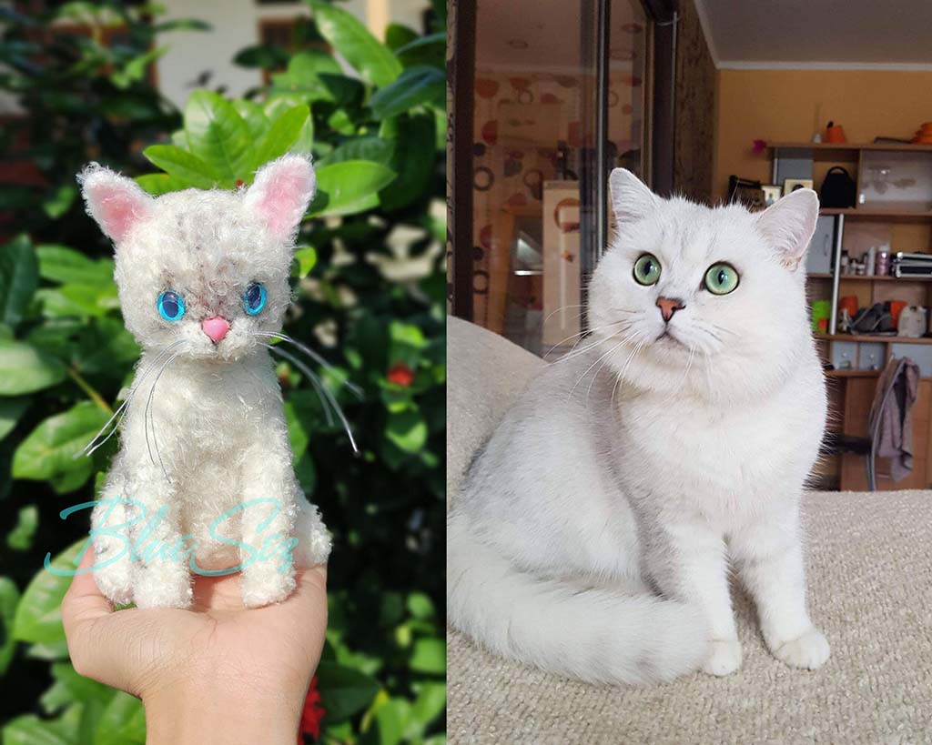 Side-by-side comparison of a real white cat with green eyes and a handmade plush toy replica with blue eyes and pink nose.
