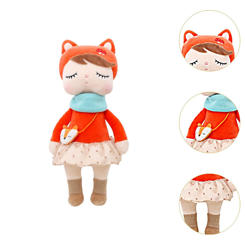 Soft plush doll wearing a red hood with cat ears, blue scarf, and polka-dot skirt, holding a small animal-shaped bag, shown with close-up detail views.