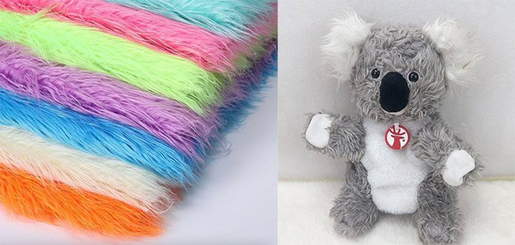 Stacked colorful long-pile plush fabrics beside a gray koala stuffed toy, demonstrating material options and finished plush toy examples for manufacturing.