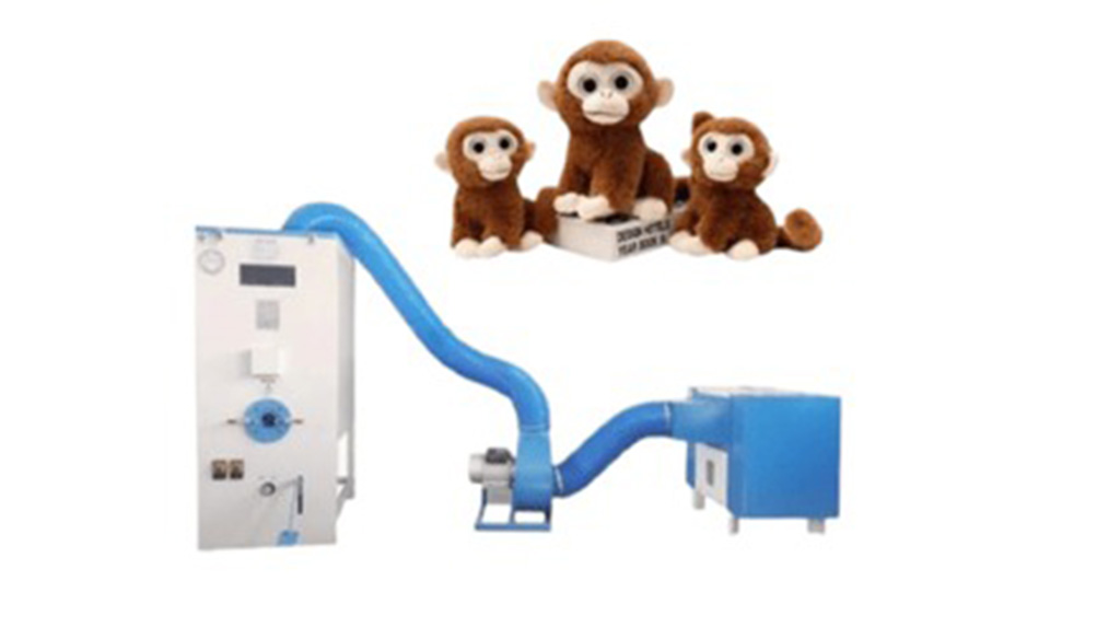 Industrial stuffing machine with blue hose used for filling plush toys, shown with finished brown monkey plush samples.