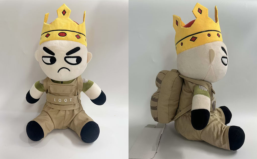 Front and side views of a custom plush character wearing a crown, khaki outfit, and backpack with embroidered facial expression.