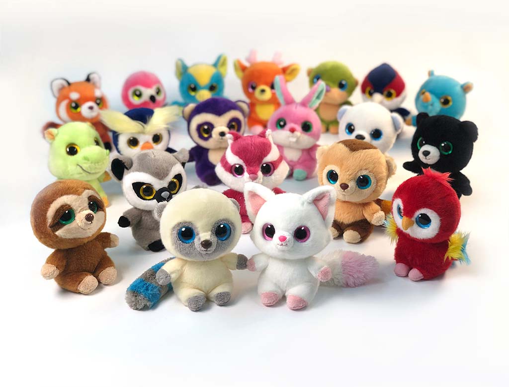 Group of small plush animal toys with big glittery eyes in various bright colors arranged on a white background.