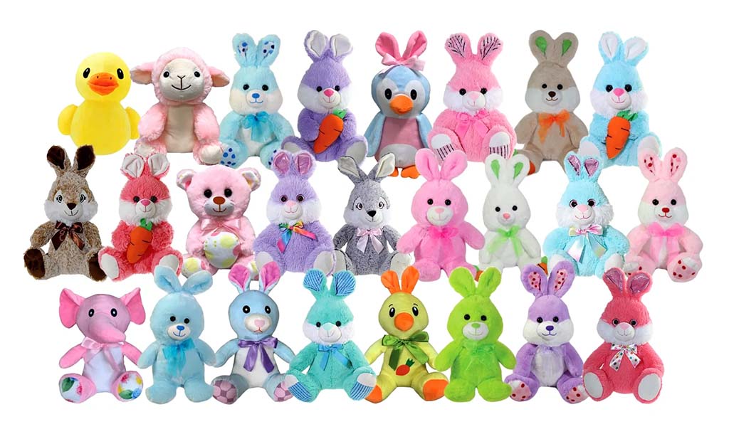 A colorful assortment of Easter-themed plush toys including bunnies, ducks, penguins, and elephants in pastel colors with ribbons and carrots.