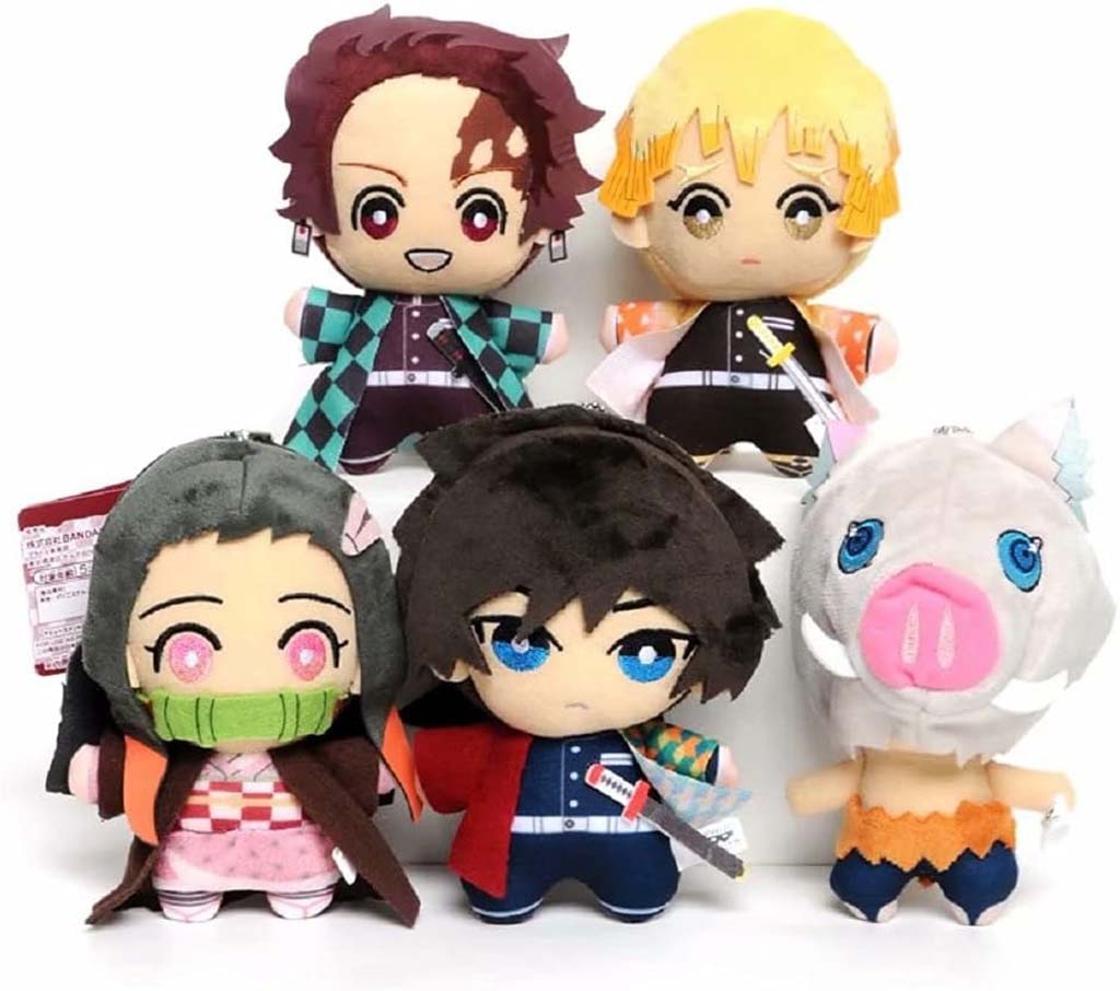 Five anime-style plush dolls with colorful outfits and expressive faces arranged in a group.