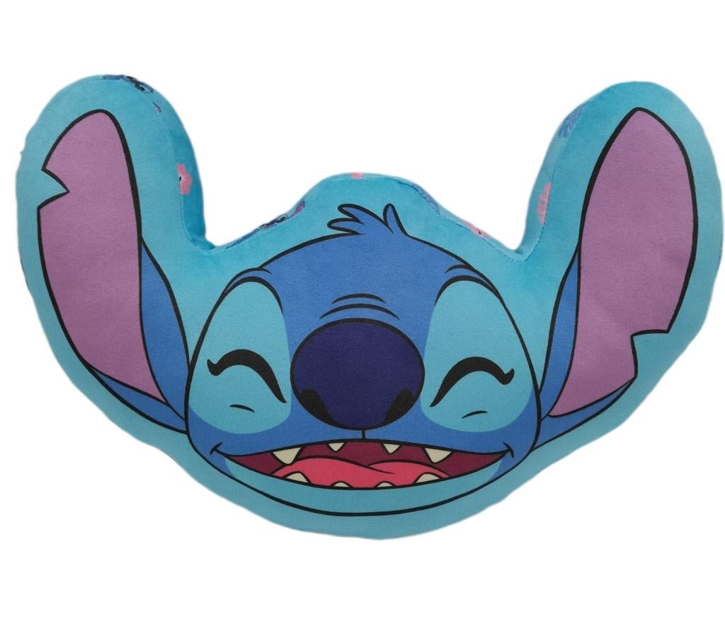 Cute blue plush pillow shaped like a smiling alien face with big purple ears and a wide grin, made from soft fabric.