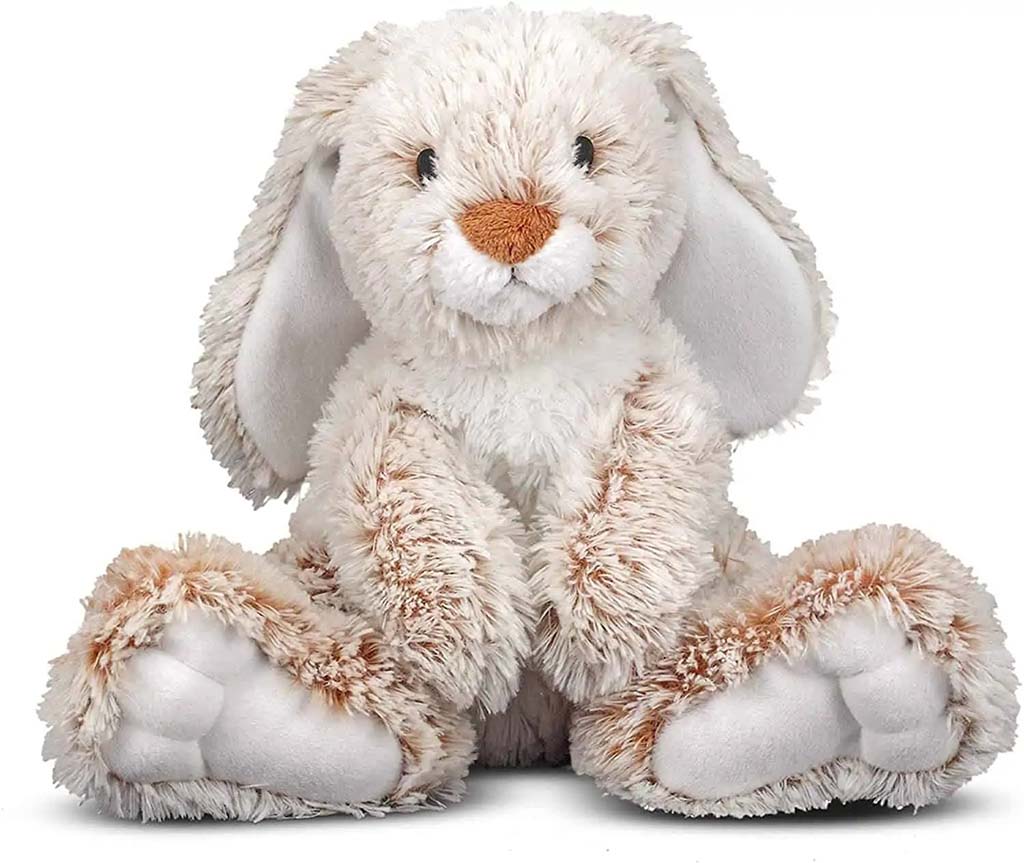 A soft beige and white bunny plush with floppy ears and a cute brown nose sitting upright against a plain white background.