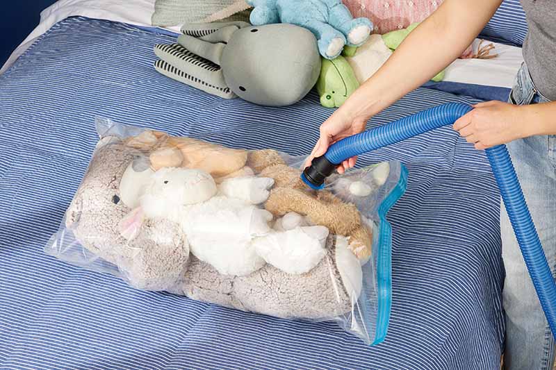 Compact and vacuum-sealed plush doll packaging