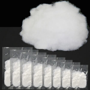 High-elastic polyester fiberfill shown loose and in small sealed packets, used as soft, lightweight stuffing for plush toys and handmade crafts.
