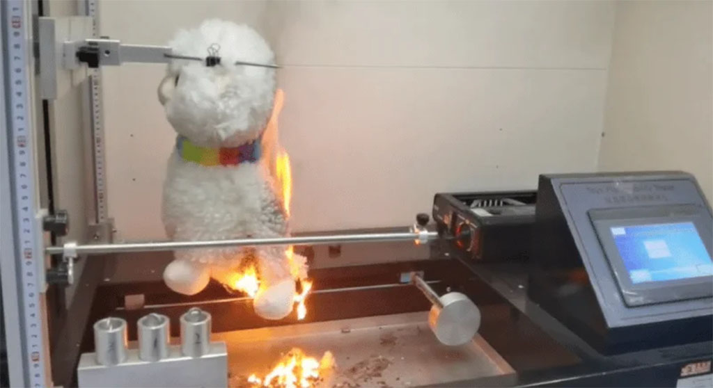 Stuffed animal undergoing flammability testing in a safety laboratory to evaluate fire resistance and compliance with toy safety standards.
