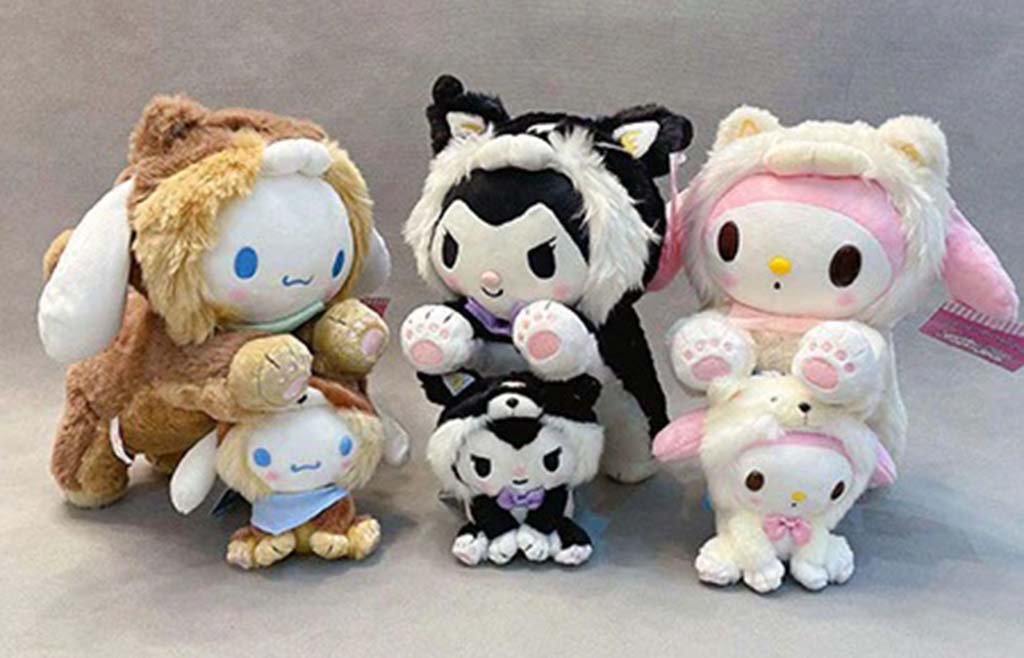 Group of colorful plush dolls dressed as animals, featuring bunny, cat, and lamb costumes with adorable pastel details.