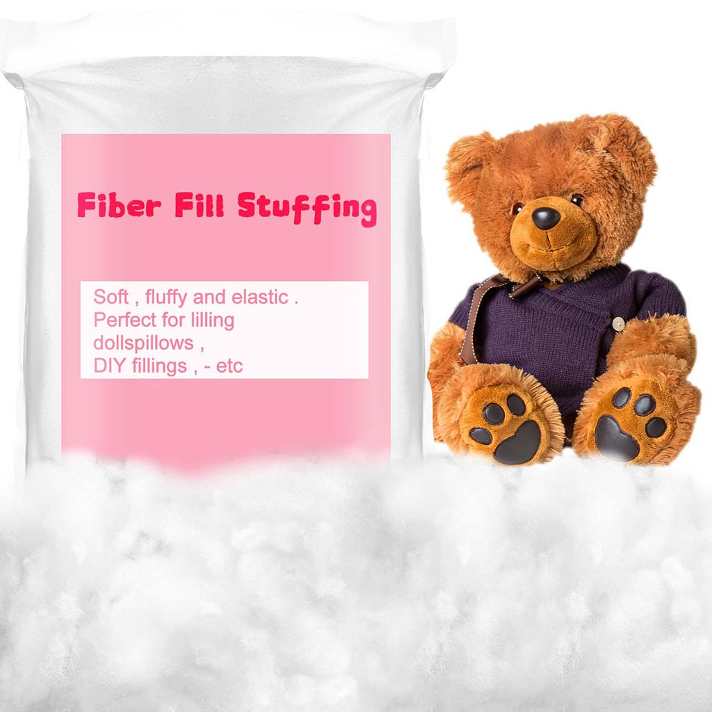 Bag of soft polyester fiberfill stuffing with a teddy bear beside it, showing fluffy, lightweight filling used for plush toys, dolls, pillows, and DIY crafts.