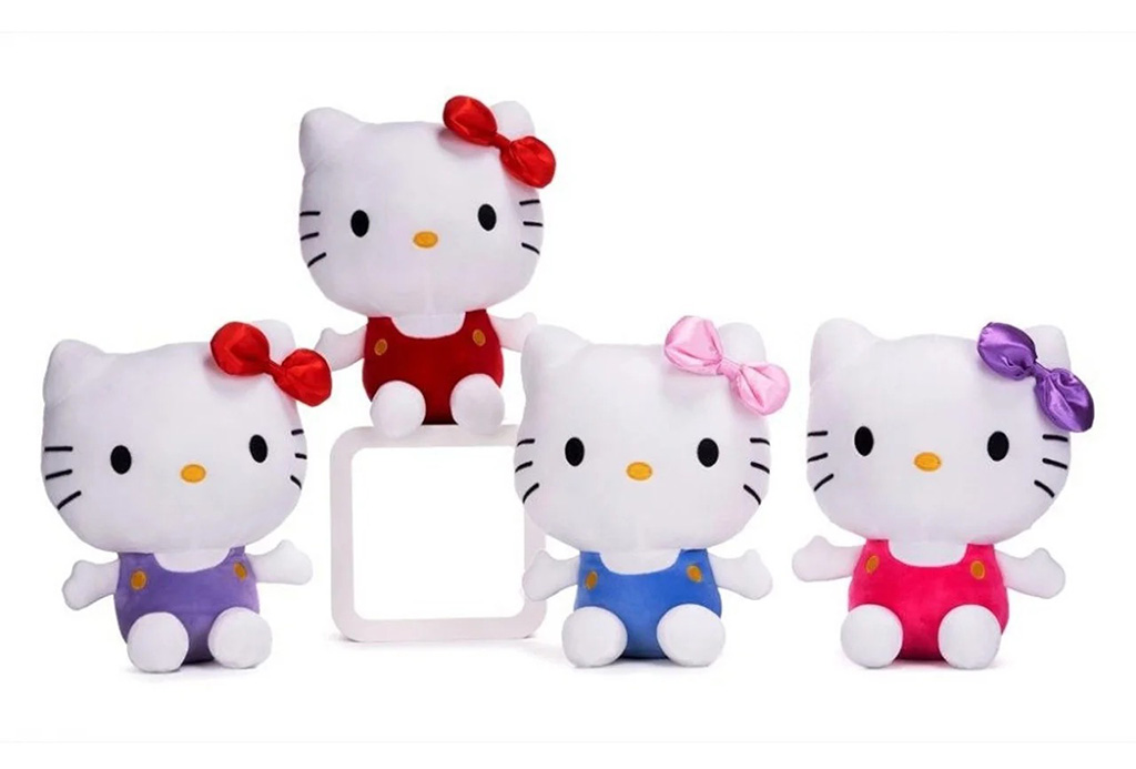 Four Hello Kitty plush toys in colorful outfits and bows, arranged together on a white background.