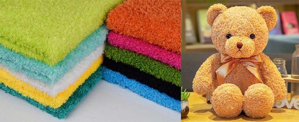 Colorful stacked seaweed fleece fabric samples beside a finished teddy bear made from the same soft, textured material, showing its cozy and fluffy appearance.