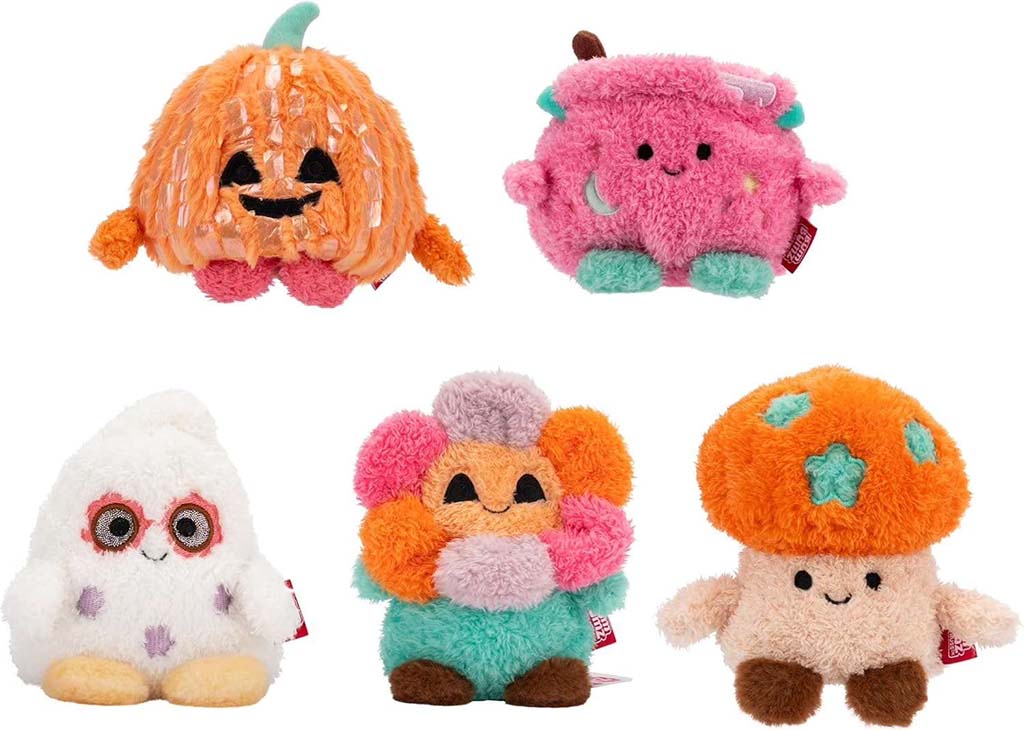 A set of five cute Halloween plush toys shaped like a pumpkin, cauldron, ghost, flower, and mushroom, featuring soft textures and bright pastel colors.
