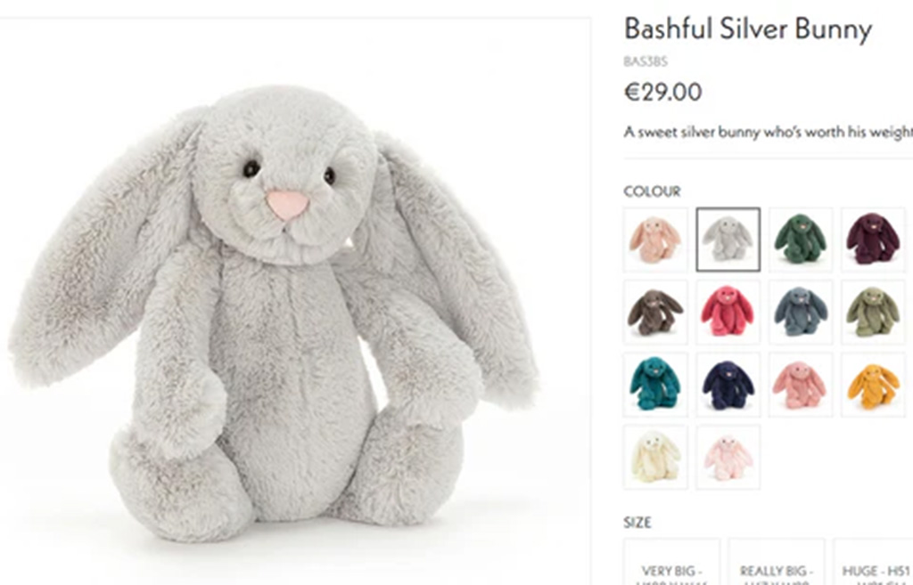 Product listing of a soft silver plush bunny with long ears shown alongside multiple color options on an online shop page.