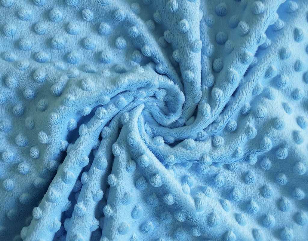 Soft blue minky plush fabric with raised dot texture, commonly used for baby toys and stuffed animals.