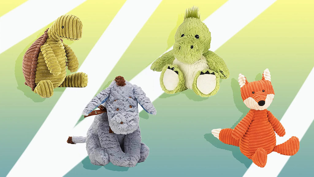 Four corduroy-style plush animals displayed on a green striped background, including a turtle, a green dinosaur, a floppy-eared gray dog, and an orange fox, all sitting upright with a soft, cuddly appearance.