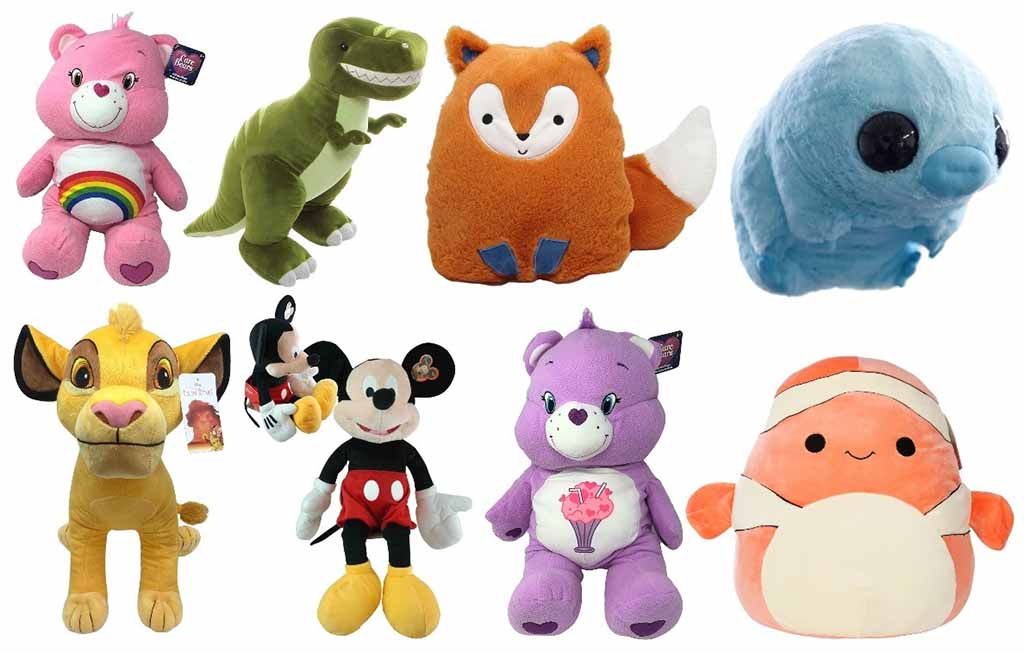 Collection of colorful plush toys including bears, dinosaur, fox, sea creature, cartoon characters, and animal designs displayed together on a white background.