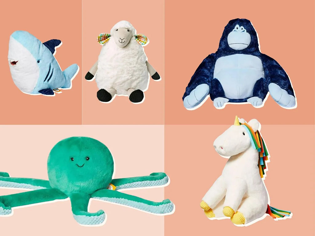 A colorful grid display of plush stuffed animals on a peach background, including a soft shark, fluffy sheep, large gorilla, smiling octopus, and a unicorn plush, each designed with rounded shapes and a cuddly, comfort-focused style