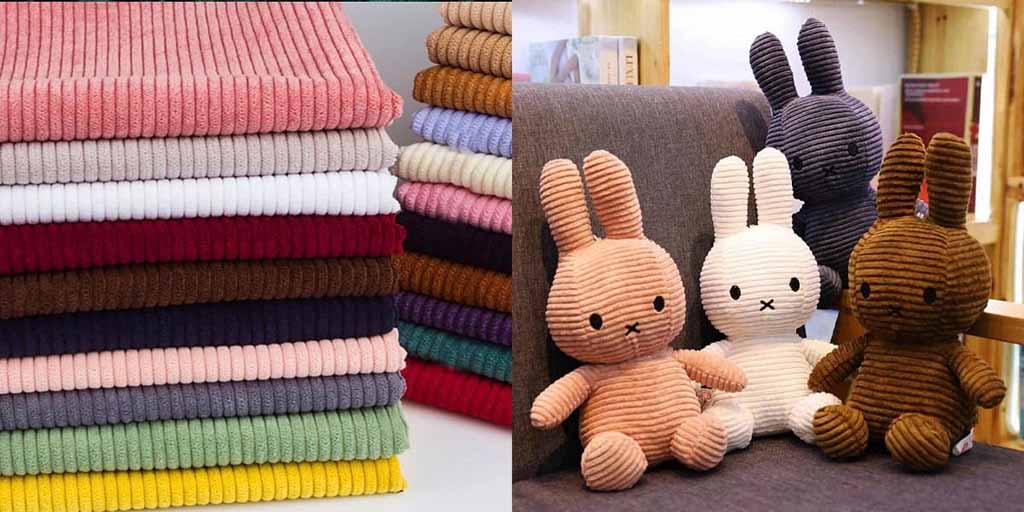 Corduroy fabric stacked in multiple colors alongside corduroy plush bunny toys, highlighting ribbed texture, softness, and color variety used in stuffed animal manufacturing.