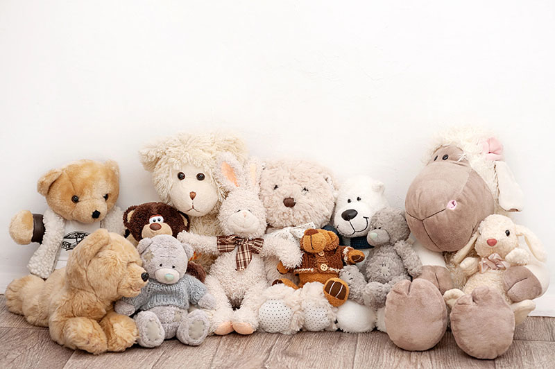 A group of soft plush toys arranged together, featuring teddy bears and animal stuffed toys made with gentle fabrics, suitable for children, nursery decor, gifting, and comfort-focused play.