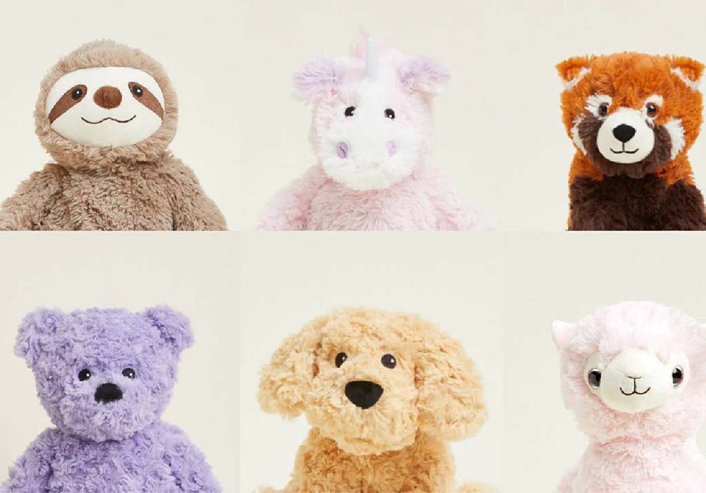 A grid of six plush animals, including a sloth, unicorn, red panda, purple bear, beige dog, and pink alpaca, displayed against a neutral background.