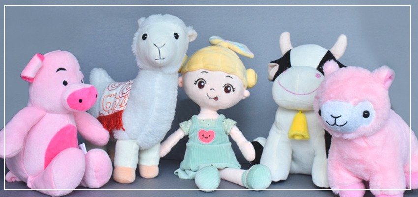 A group of colorful plush toys including a pink pig, white alpaca, soft doll, cow, and pink lamb, arranged side by side, made with gentle plush fabrics and embroidered details, suitable for children’s stuffed animal collections, baby gifts, nursery decor, and custom plush toy manufacturing inspiration.
