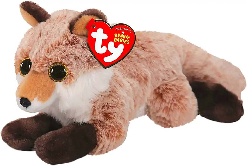Brown fox plush toy lying down with soft fur, white chest, dark paws, and a red heart-shaped tag attached to its ear.
