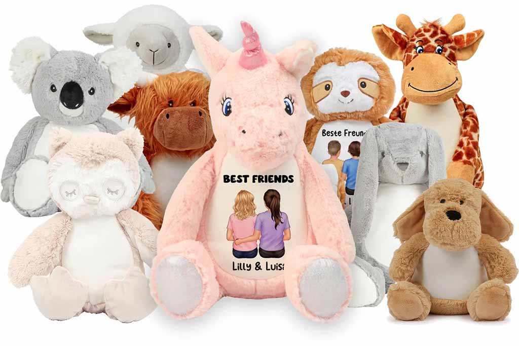 A collection of plush animals, including a unicorn with a personalized “Best Friends” message, surrounded by koala, owl, cow, sloth, giraffe, sheep, and dog plush toys.