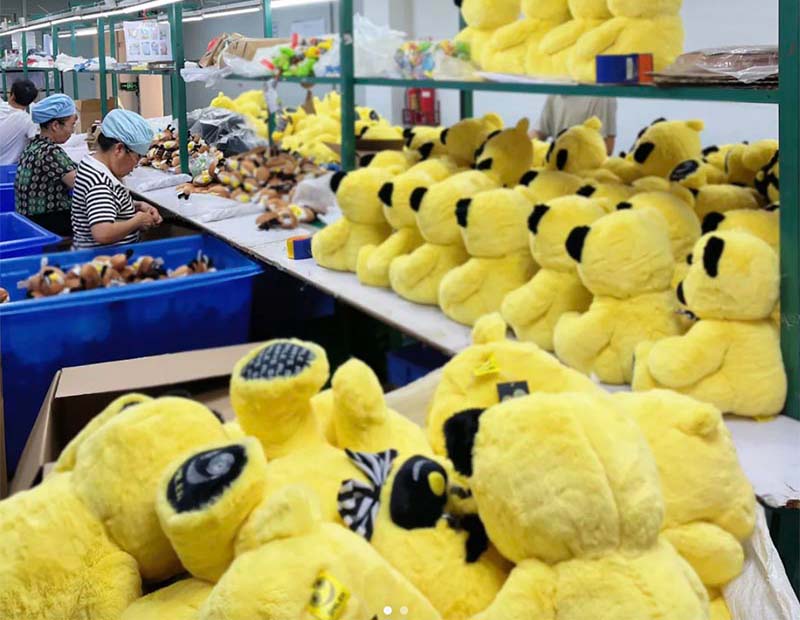Plush toys are assembled and sorted in batches to support efficient mass production and quality control.