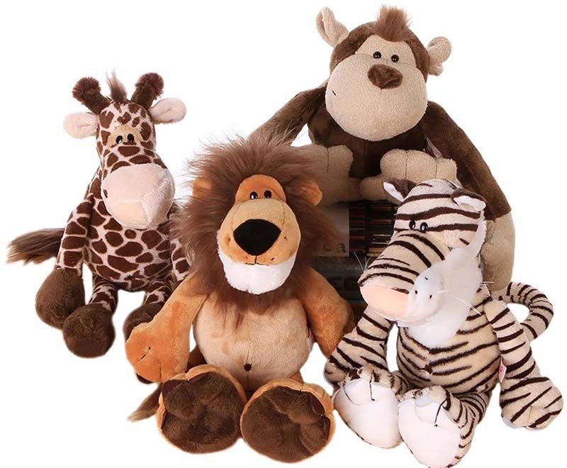Group of safari plush animals on a white background, including a giraffe, lion, monkey, and zebra.
