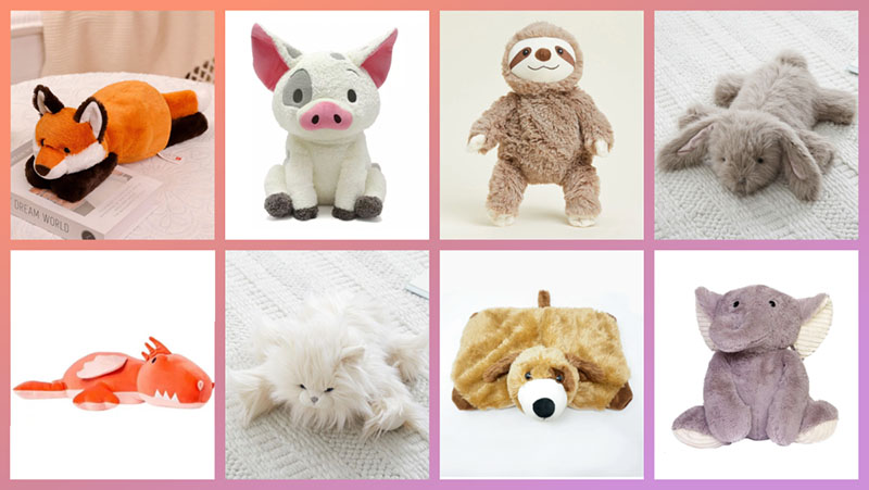 Orange fox plush toy lying flat with soft fur and relaxed sleeping pose