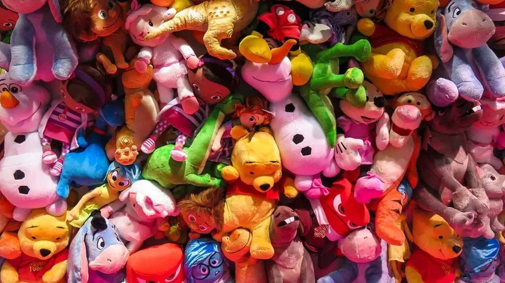 A vibrant mix of plush toys in various characters and sizes, showcasing diversity for retail and promotional markets.