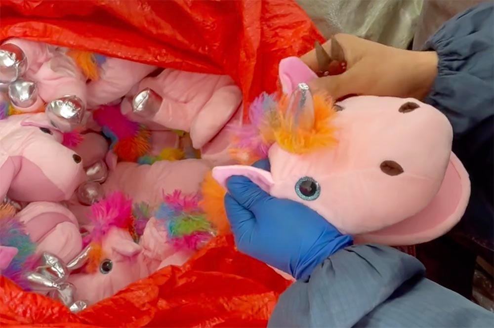 Plush toys are manually inspected to ensure appearance, stitching, and finishing meet quality standards before shipment.