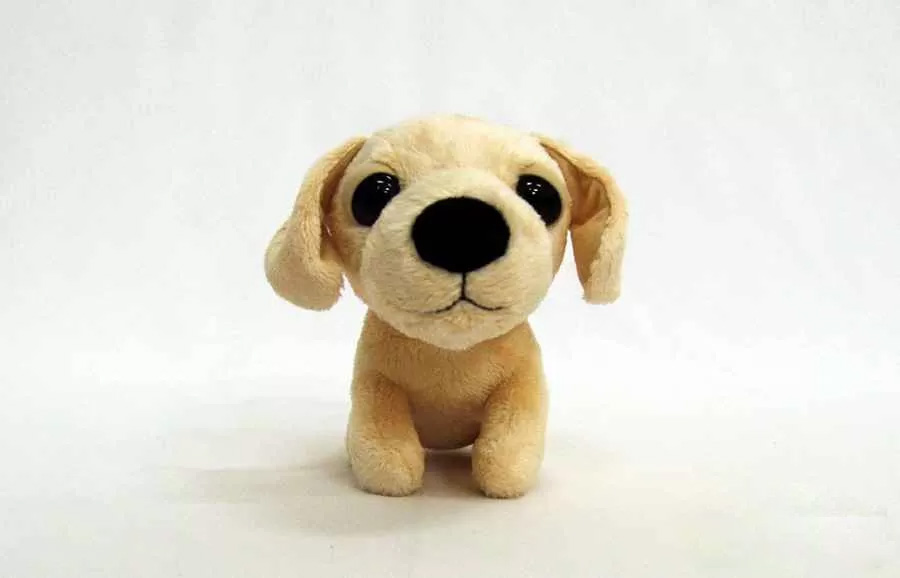 A small puppy plush toy with a simple, friendly design and soft texture, suitable for children and gift collections.