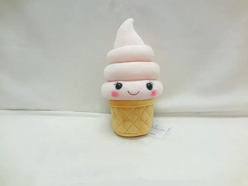 A soft ice cream cone plush toy with a smiling face and pastel colors, designed as a playful decorative plush or children’s toy.