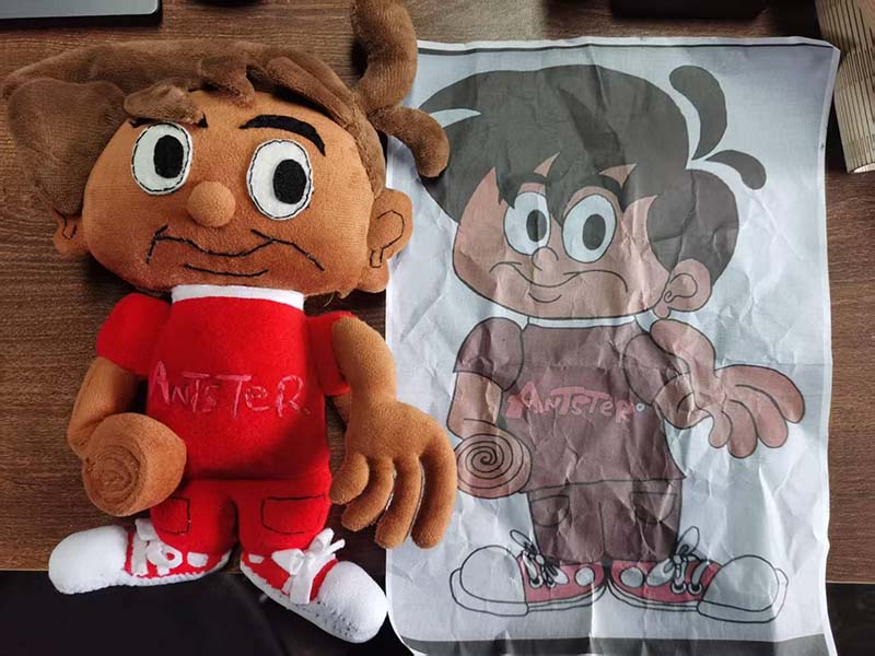 A custom plush toy, designed to resemble a cartoon character, is shown next to its original character design sketch. The image showcases the transition from 2D design to a 3D plush representation, highlighting the unique character features and detailed craftsmanship.
