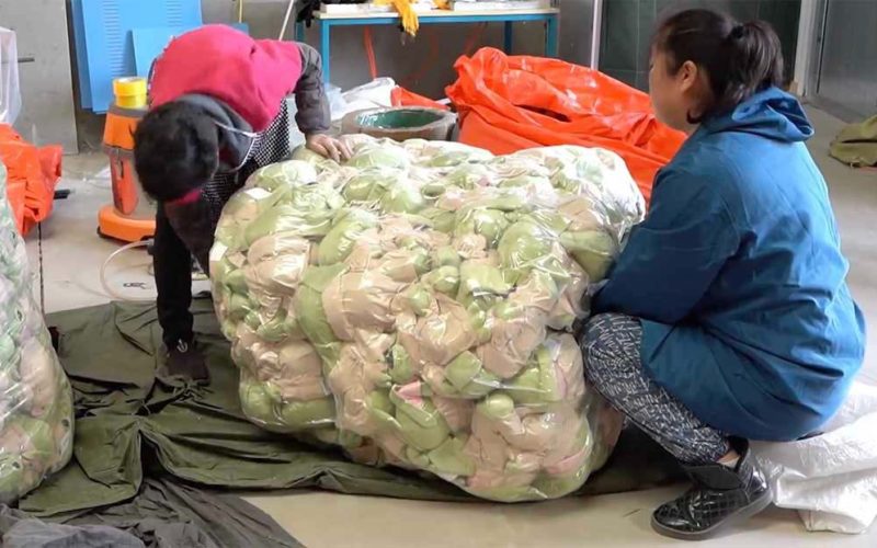 Plush toys are compressed and packed to reduce volume for efficient bulk shipping and storage.
