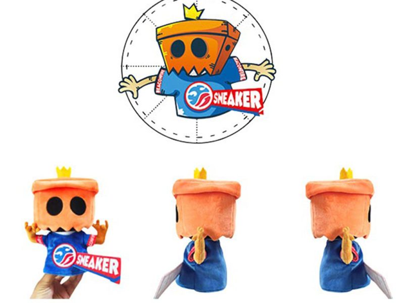 Custom plush mascot designed for a sneaker brand, shown from multiple angles with an orange square head, black eyes, crown detail, and blue branded outfit.