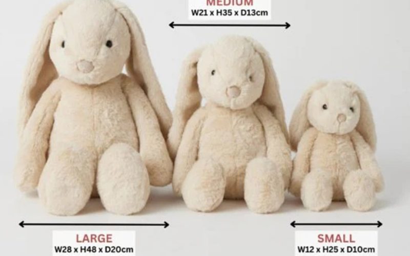 Three beige plush bunny toys displayed in small, medium, and large sizes, each labeled with their respective width, height, and depth measurements in centimeters.
