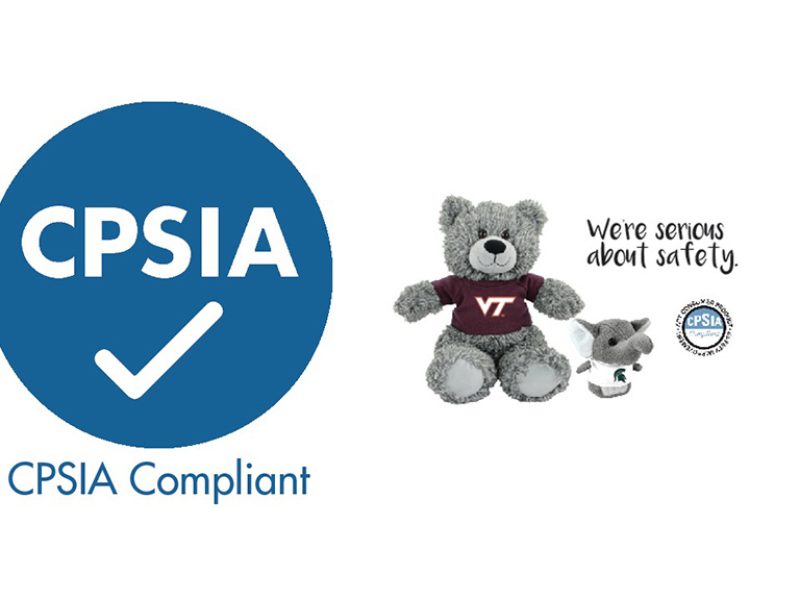 CPSIA compliance logo beside two gray plush toys wearing shirts, emphasizing product safety and compliance with U.S. toy safety standards.